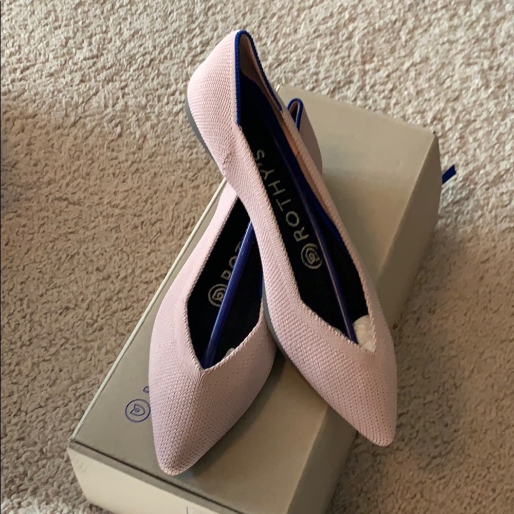 Rothy’s The Point petal pink solid flats.